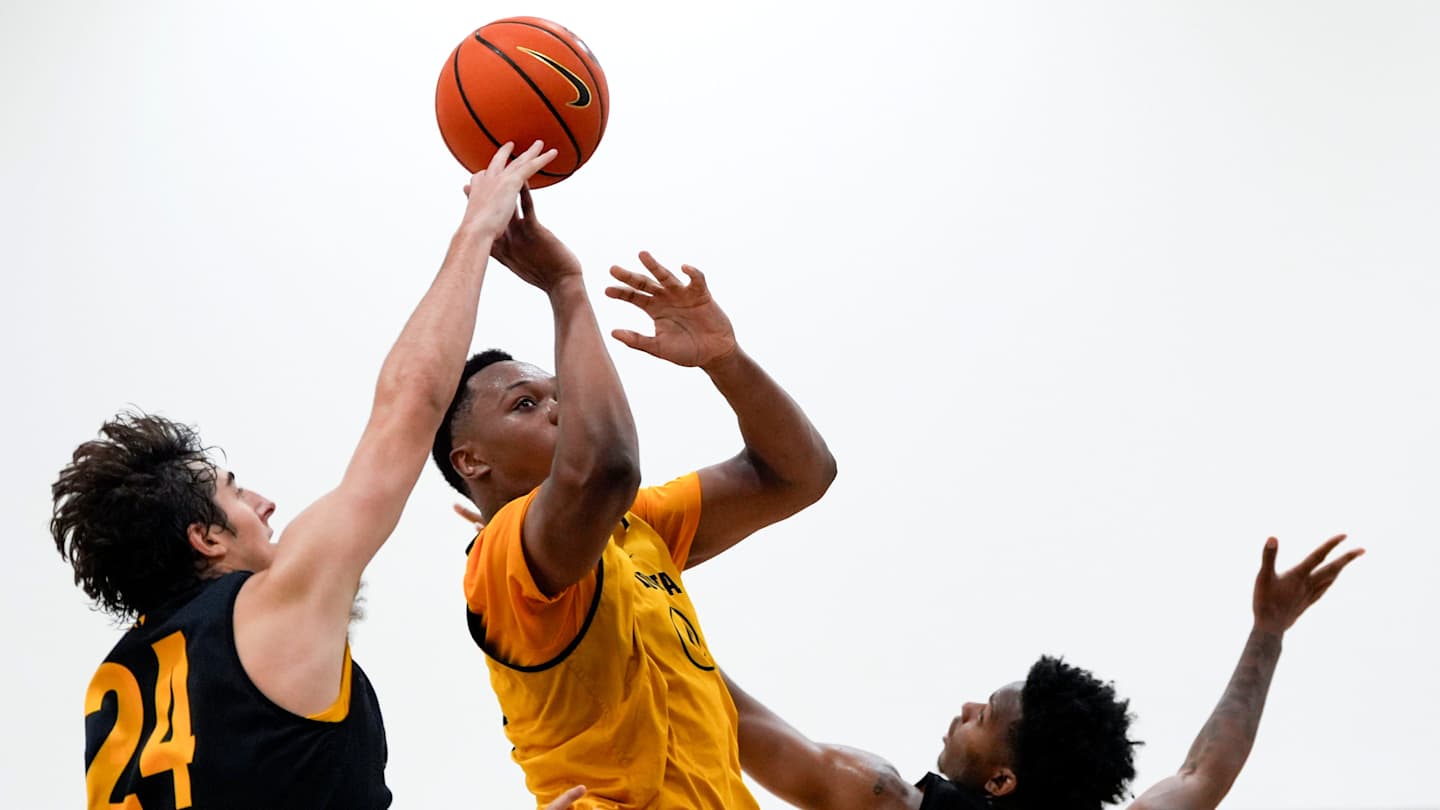 Cam Manyawu: Forward's Journey from Wyoming to Iowa Basketball